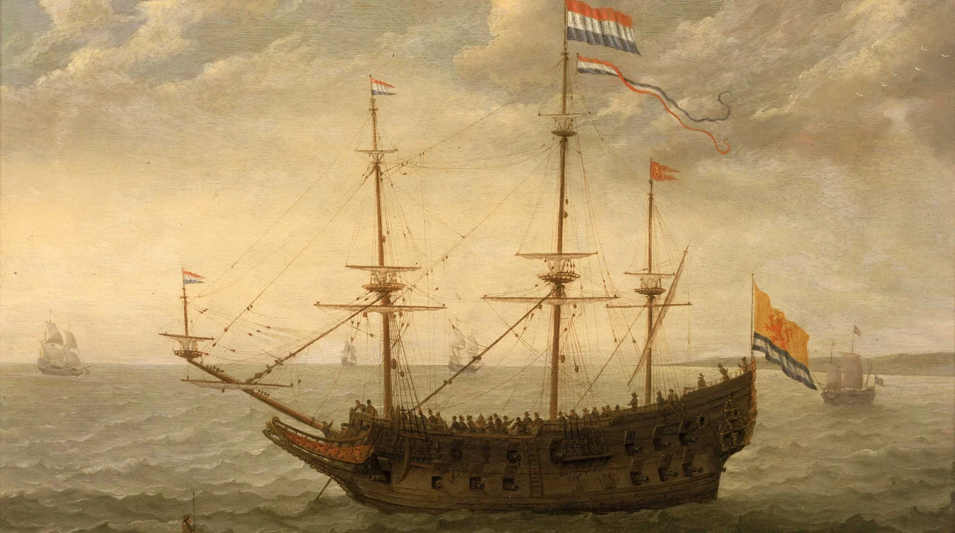 A 17th-century painting of a Dutch sailing ship riding at anchor under a cloudy sky, flags flying.