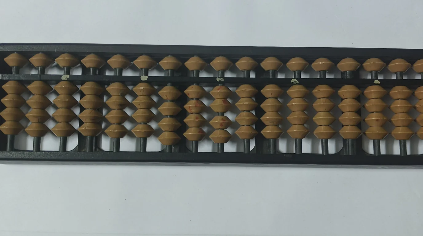 A long abacus with rows of brown wooden beads in a black frame.